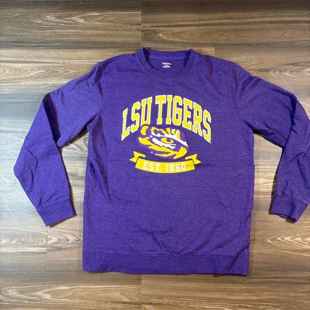 Purple LSU Tigers crewneck sweatshirt with yellow tiger graphic and 'EST. 1890'